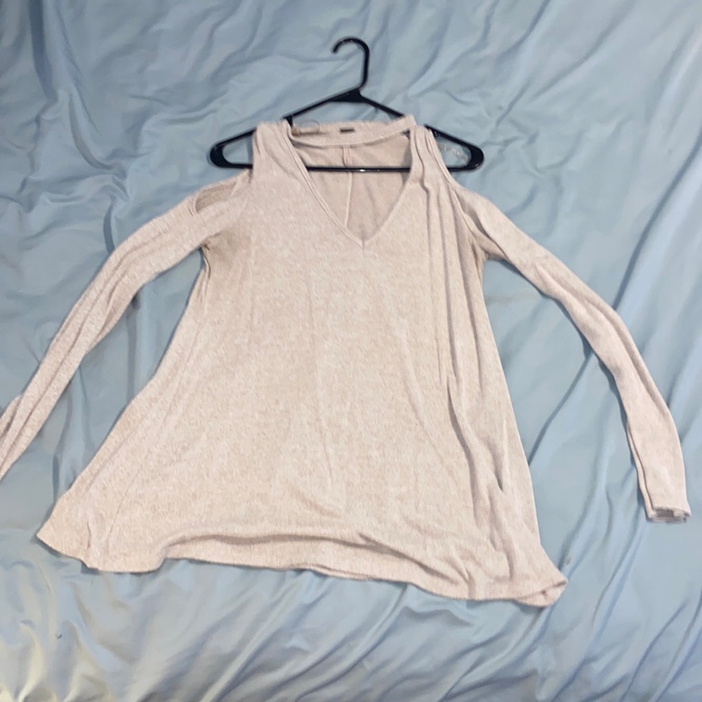 Long sleeve key hole shoulders and a choker collar.
